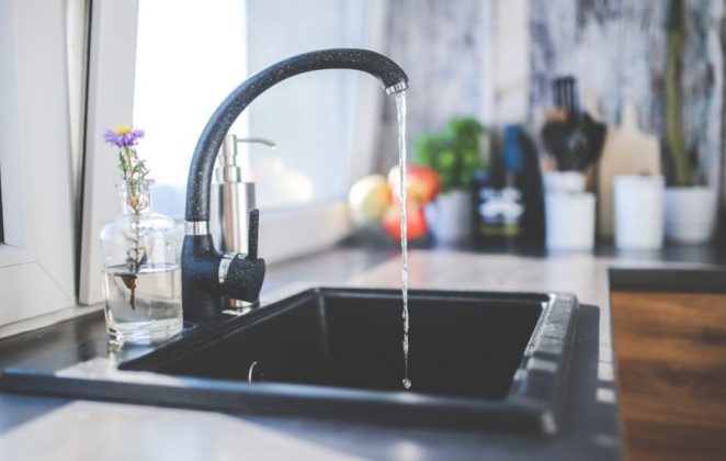 Open Faucet Flowing Water Into a Sink — Expert Plumbers in Moffat Beach, QLD